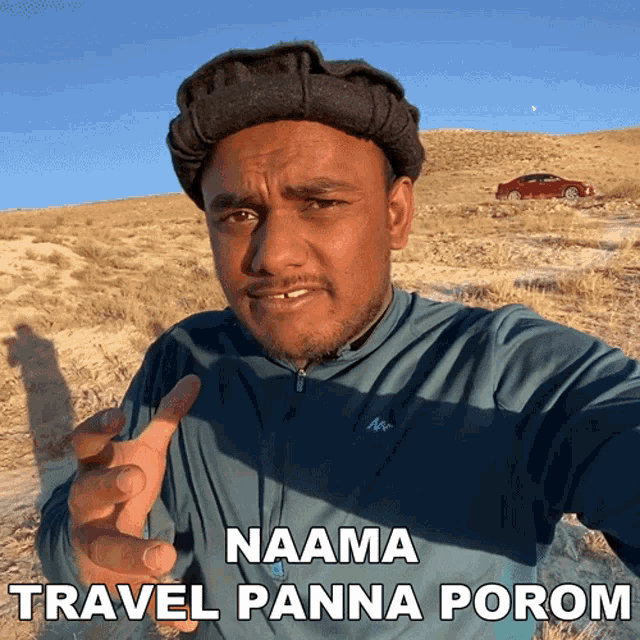 a man wearing a turban and a shirt that says ' nama travel panna porom ' on it