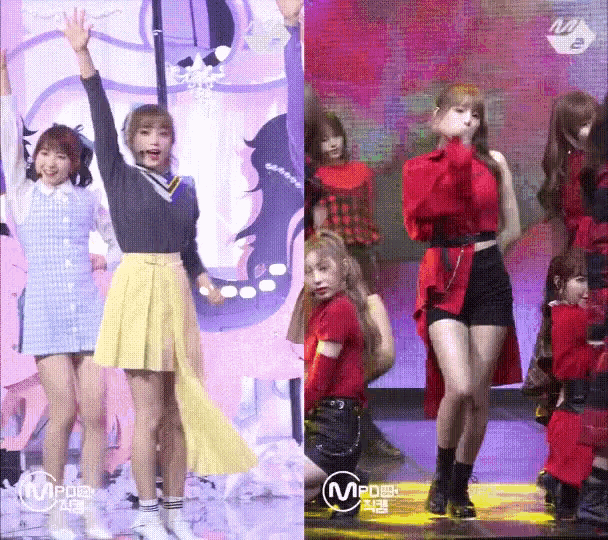 a group of girls are dancing on a stage with a m power logo on the bottom