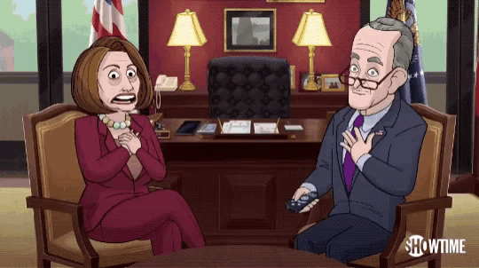 a cartoon of a man and a woman sitting at a table with showtime on the bottom