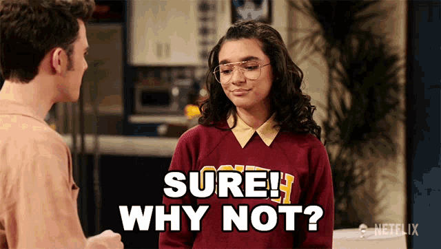 a girl wearing a sweater that says sure why not on it