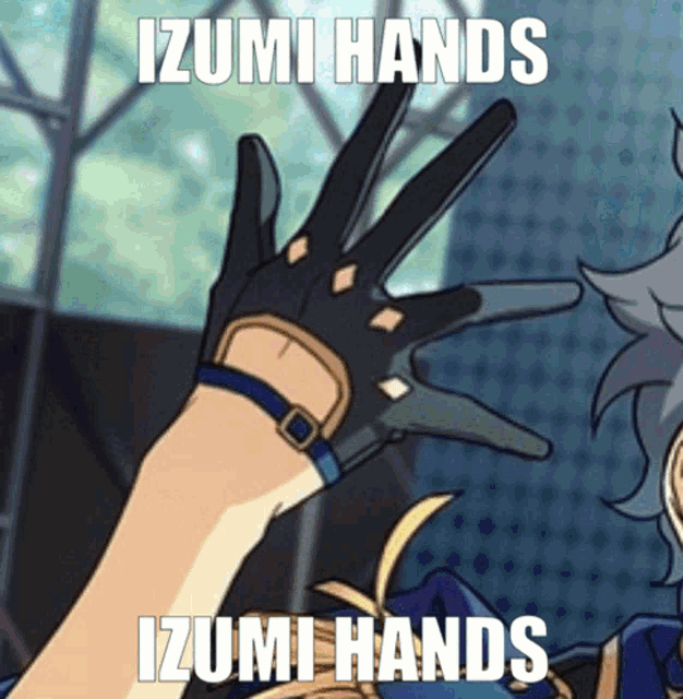 a person wearing a glove with the words izumi hands written on it