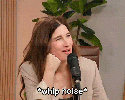 a woman sitting in front of a microphone says whip noise *