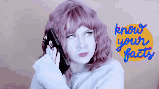 a girl with purple hair is talking on a cell phone with the words know your facts written in the background