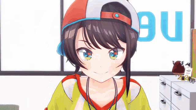 a girl wearing a baseball cap is smiling in front of a sign that says ' nbu '