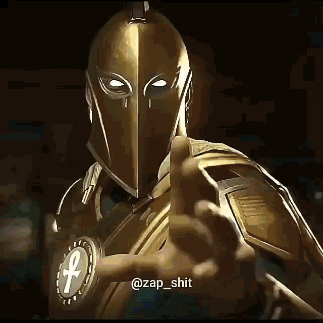 a man in a knight 's helmet is giving a middle finger