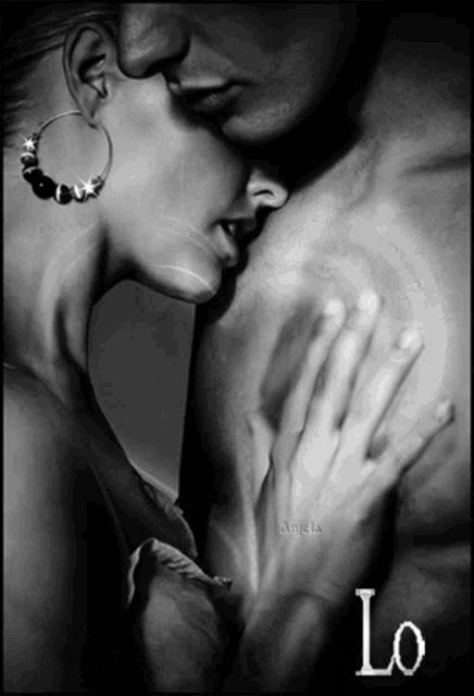 a black and white photo of a woman touching a man 's chest with the word lo in white