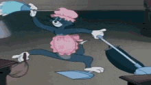 a cartoon cat is cleaning the floor with a mop and a dustpan .