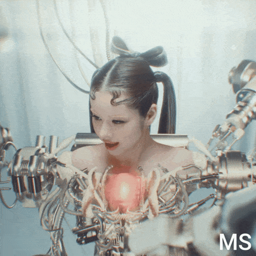 a woman is surrounded by a bunch of wires and has the letters ms on the bottom