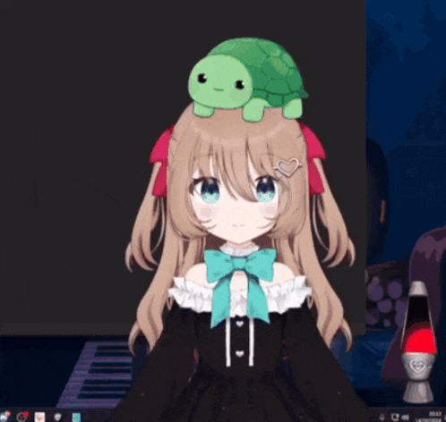 a girl in a black dress with a green bow is standing in front of a computer monitor
