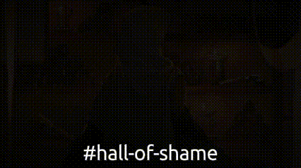 a person in a hooded jacket is standing in front of a shelf with candles and the words hall of shame .