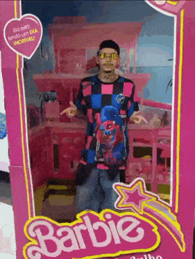 a man standing inside of a pink barbie doll