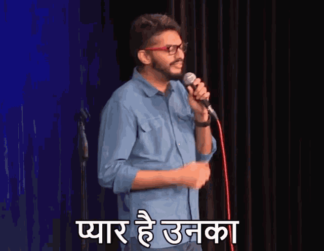 a man is singing into a microphone with the words " प्यार है उनका " written on it