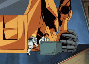 a man in a white suit is standing in front of a robot with the number 30 on it