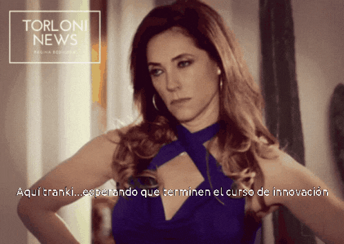 a woman in a blue dress is featured in a torloni news advertisement