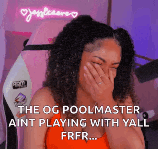 a woman is laughing while covering her face with her hand .