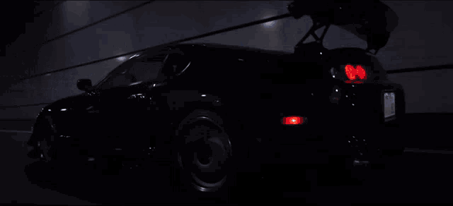 a car with a license plate that starts with the letter r