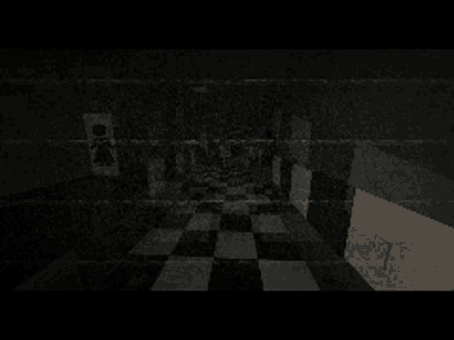 a black and white photo of a dark room with a checkerboard floor
