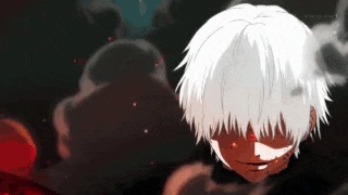 a close up of a person 's face with white hair and a red eye .
