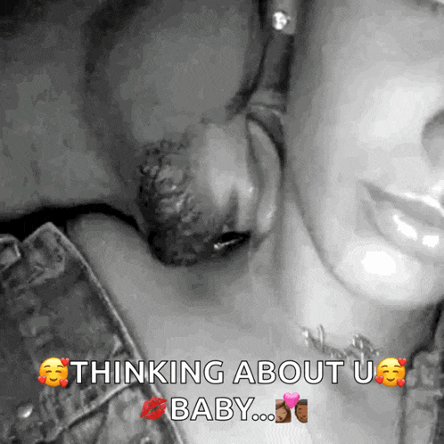 a black and white photo of a man kissing a woman 's neck with the caption " thinking about u baby "
