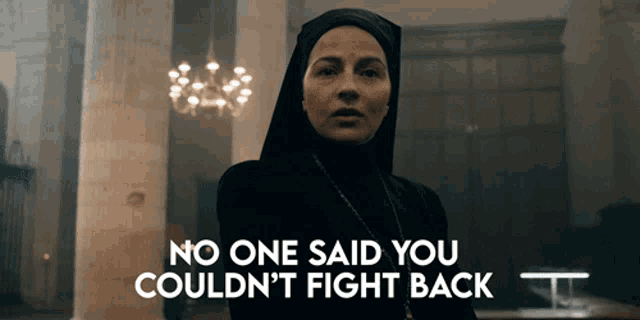a nun with the words no one said you couldn 't fight back behind her