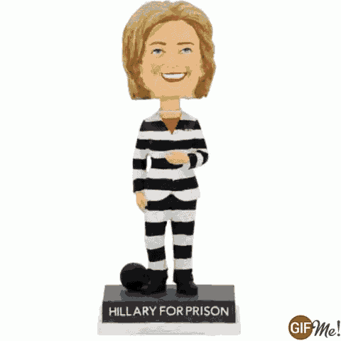 a bobble head of hillary clinton in prison