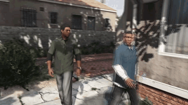 two men walk down a sidewalk in front of a brick building