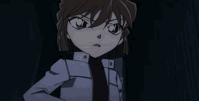 a girl with a surprised look on her face is wearing a jacket