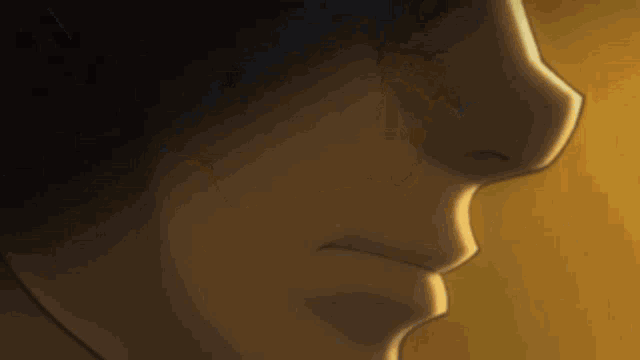 a close up of a person 's face with a yellow background
