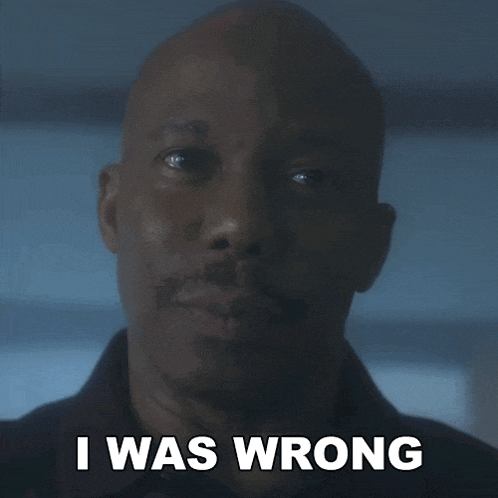 a bald man says " i was wrong " in front of his face