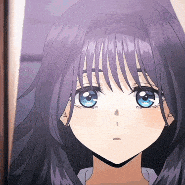 a close up of a girl with blue eyes and purple hair