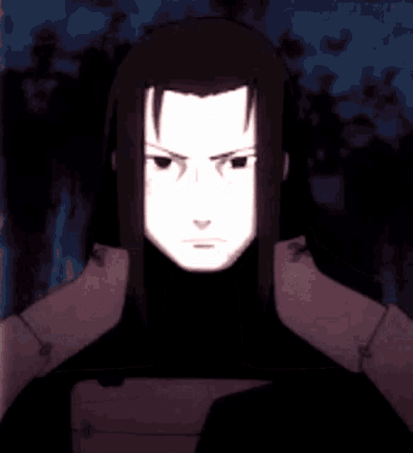 a close up of a person 's face with a serious look on their face .