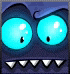 a cartoon character with blue eyes and teeth is looking at the camera .