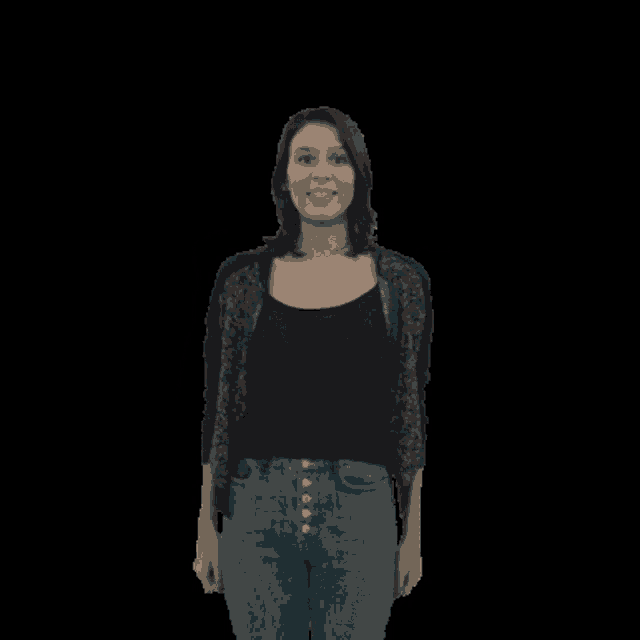 a woman with her arms outstretched and a black shirt