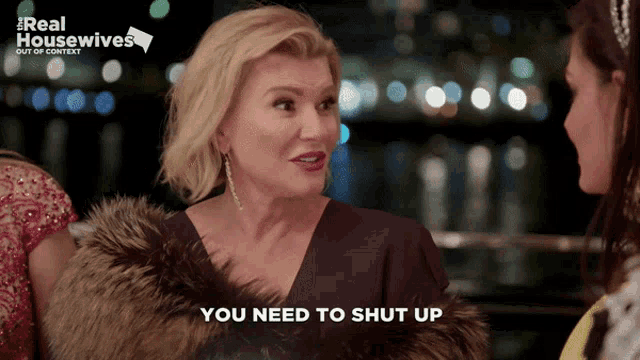 a woman says you need to shut up in front of a real housewives ad