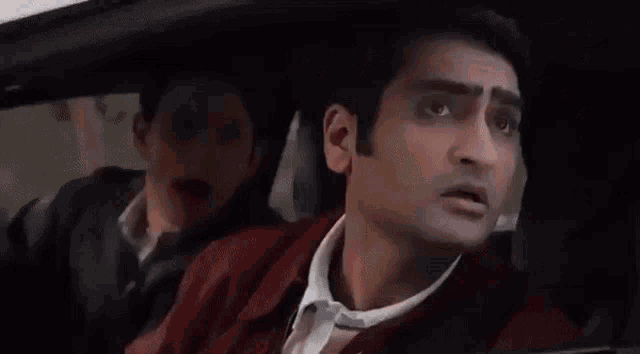 two men in a car with the words how would you on the screen