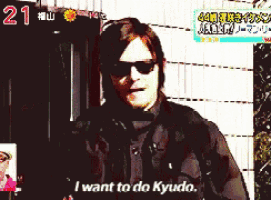 a man wearing sunglasses says " i want to do kyudo "