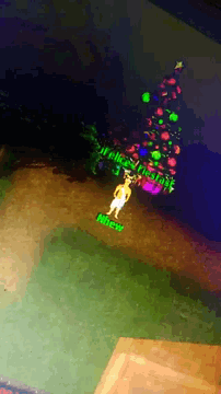 a green sign that says merry christmas is on the ground