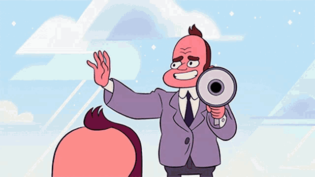 a man in a suit and tie holding a megaphone