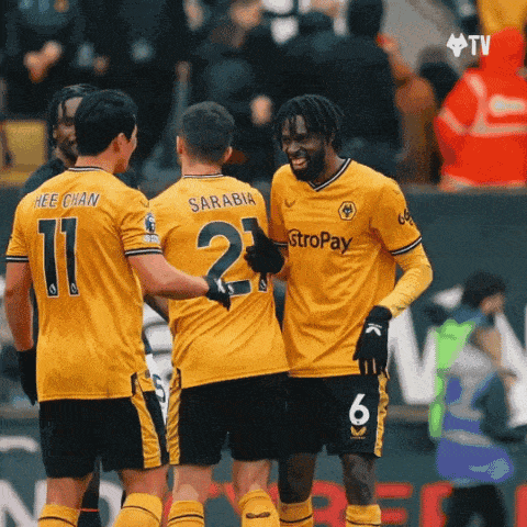 a group of soccer players wearing yellow jerseys with stropay written on them