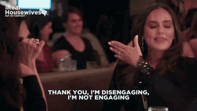 a woman says " thank you i 'm disenaaging i 'm not engaging "