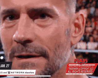 a close up of a man 's face with a watermark that says raw on it