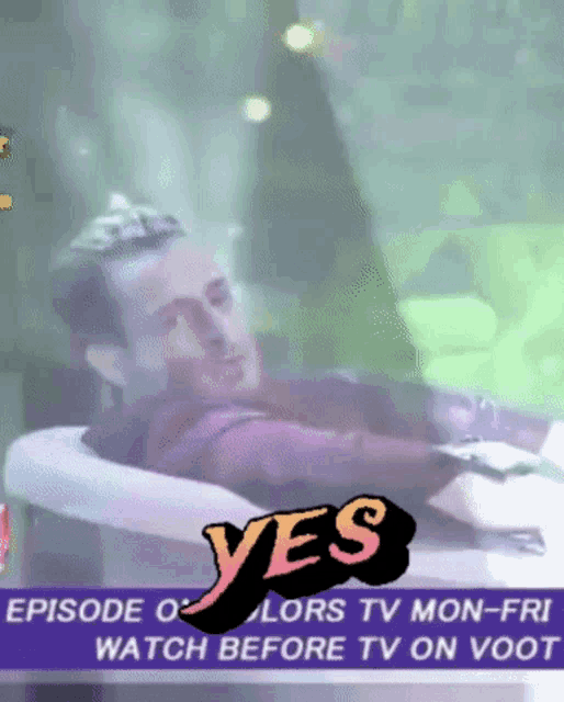a man is laying in a tub with the words yes on the top