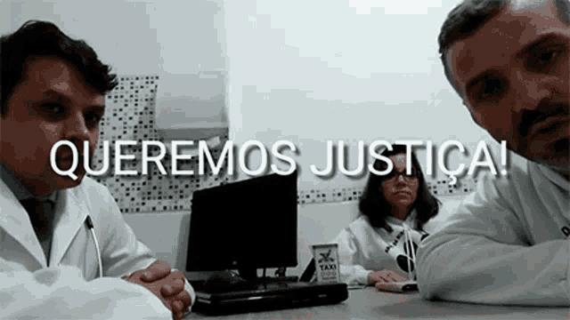 a group of people sitting at a table with the words " queremos justica " written on the bottom
