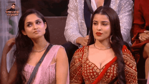 two women are sitting in front of a screen that says weekend ka vaar