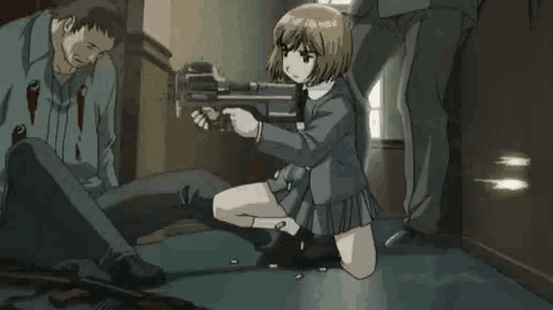 a girl is kneeling on the floor holding a gun while a man is laying on the floor .