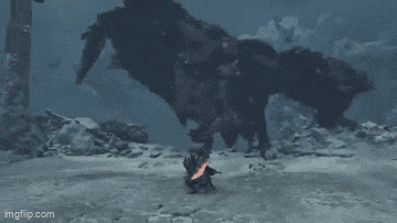 a person is fighting a monster in a video game while holding a sword .