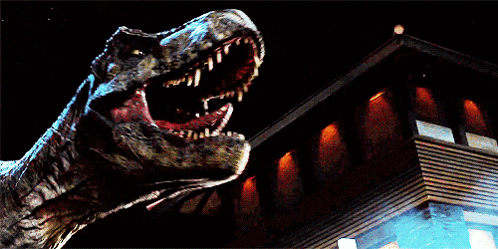 a close up of a dinosaur 's mouth with its mouth open