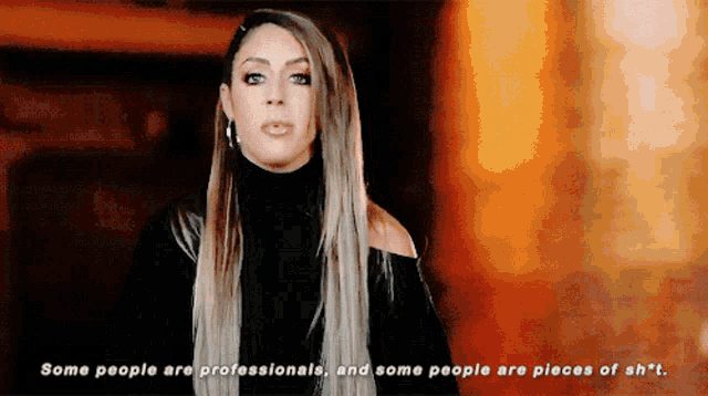 a woman in a black top says some people are professionals and some people are pieces of shit