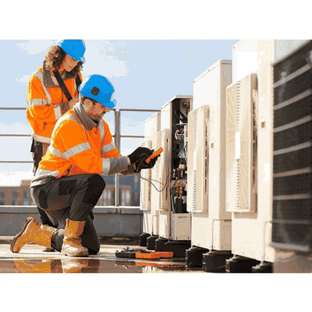 a man and a woman working on a building