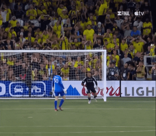 a soccer goalie with the number 50 on his shirt